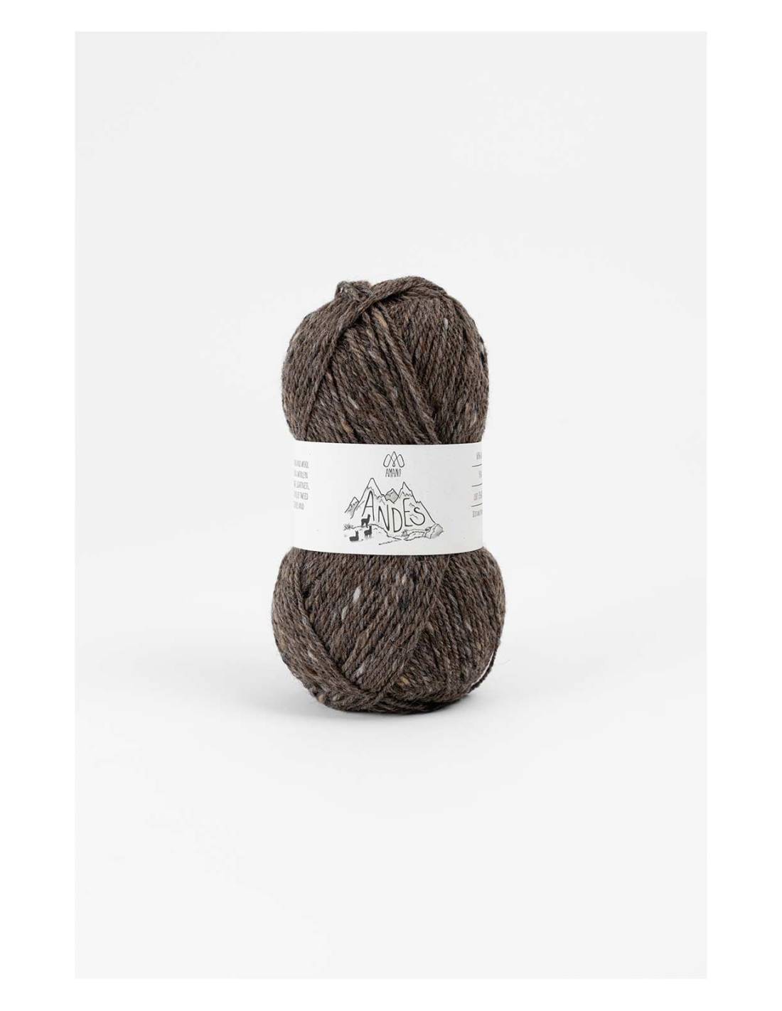 Ball of brown yarn with a label on a white background